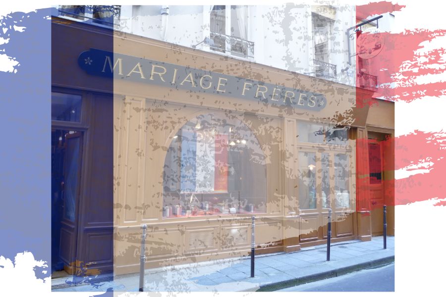 Photo of Mariage Freres shopfront overlaid with a French flag